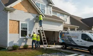 Vinyl siding repair after storm damage in Cleveland, OH for a home exterior by sidingcleveland.com